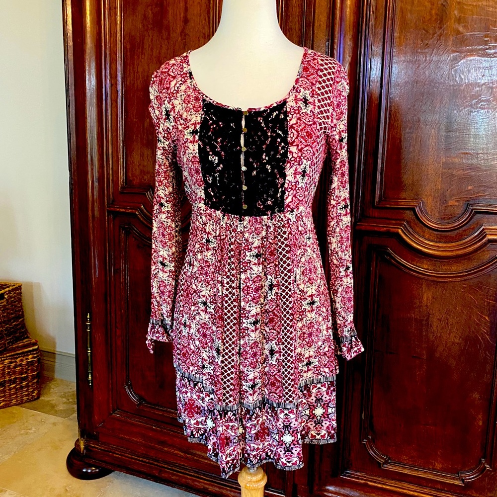 multi red tone print with black trim dress